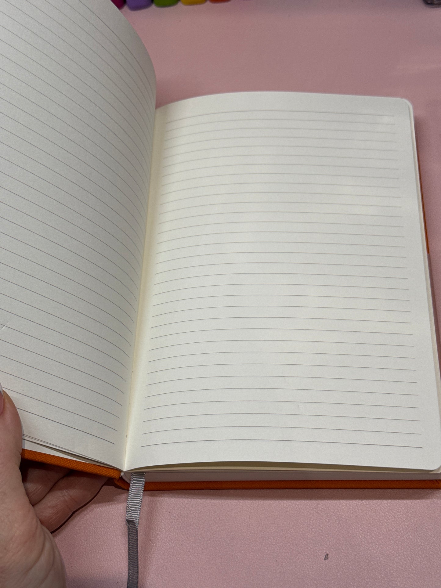 Osprey orange notebook